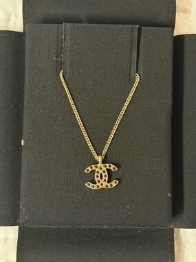 CHANEL Gold CC Pendant Necklace with Black Accents